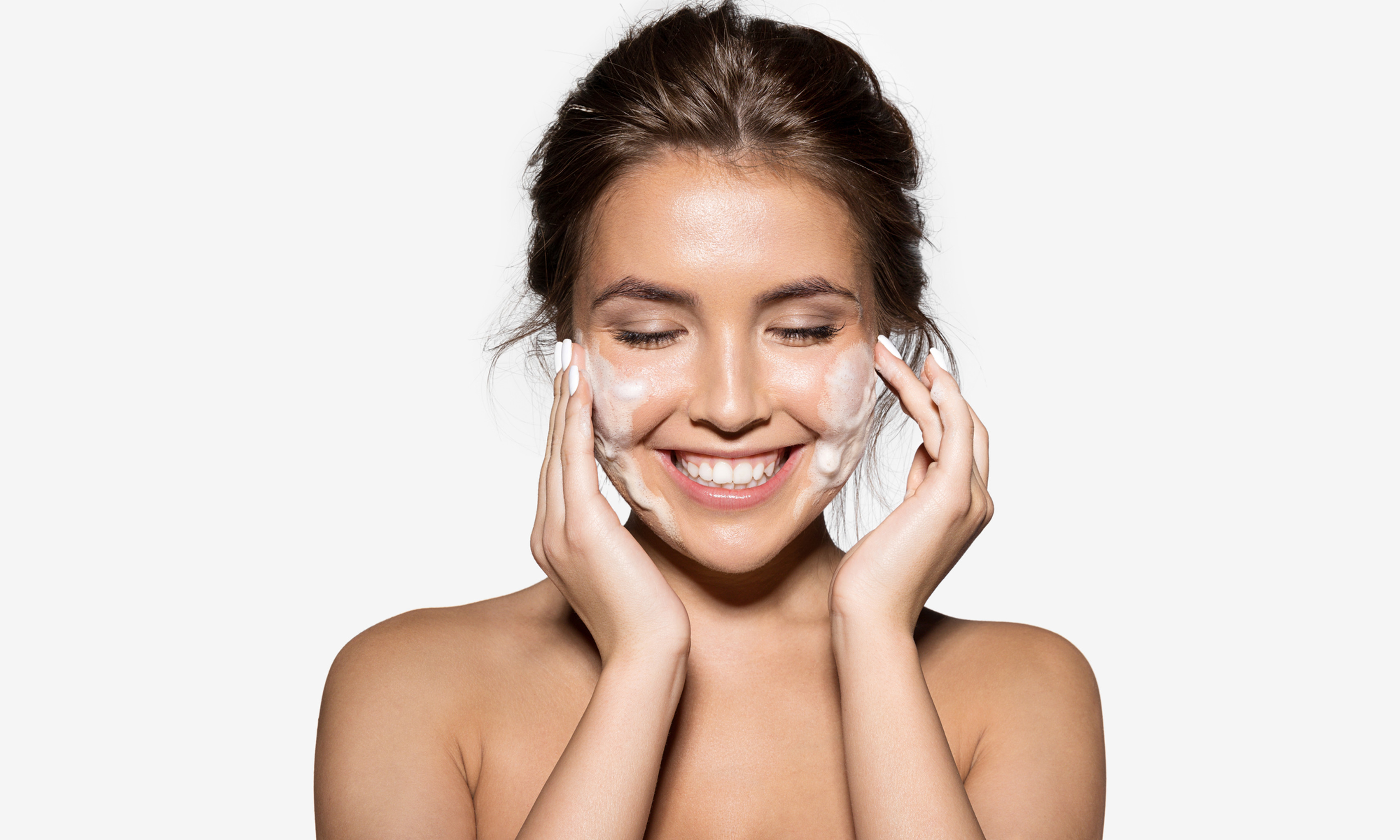 young women washing her face